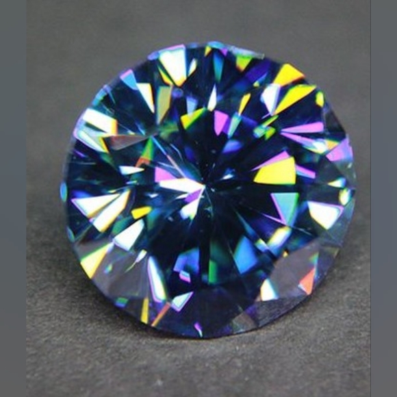 Strontium Titanate is a Man Made Gemstone with brighter Refractive Properties - Picture 6 of 7